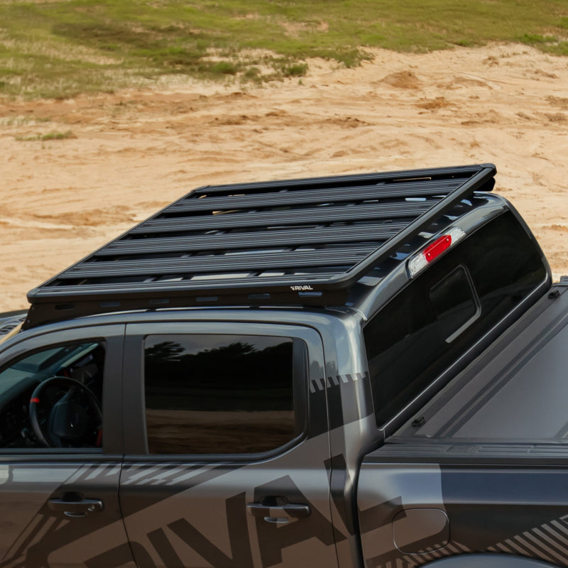 Rival 4x4 aluminum roof rack for Ford Ranger 24-26 and Ranger Raptor, mounted on vehicle roof for cargo transport