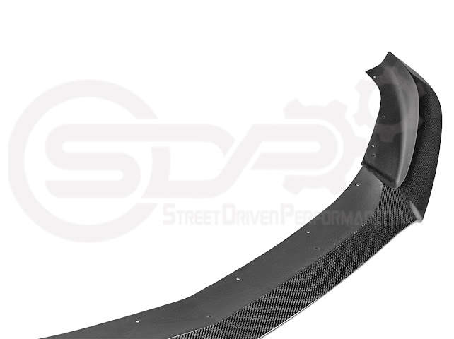 Black carbon fiber front bumper lip splitter for Cadillac CT5 Sport and V models, designed for sporty ground effects.