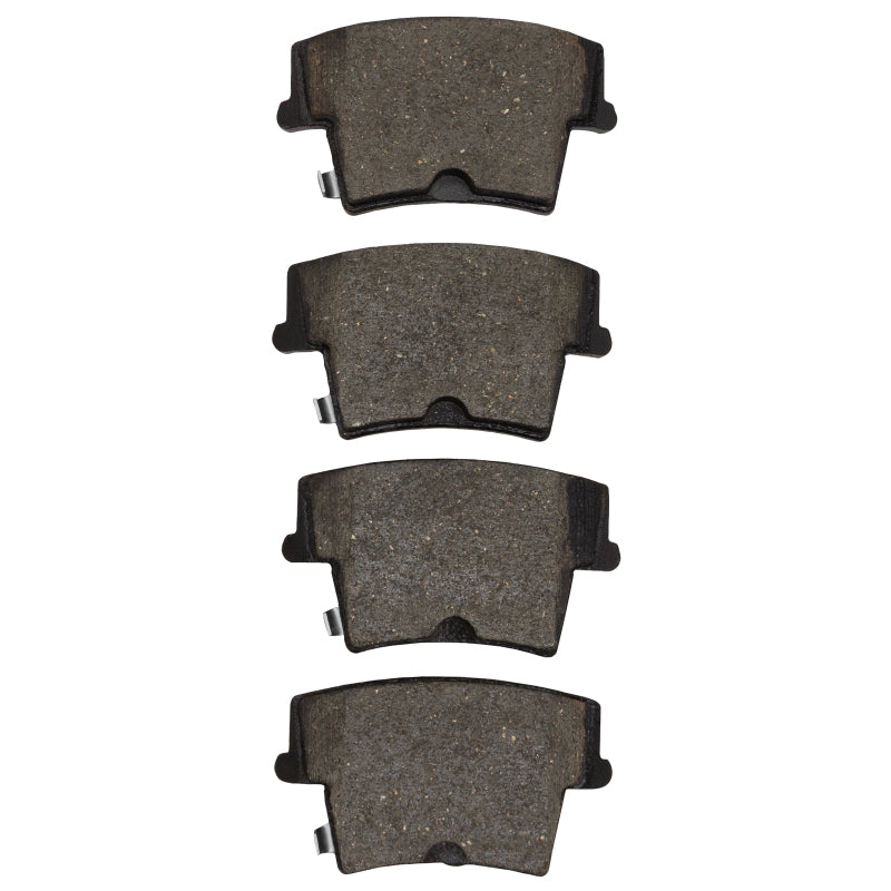 R1 Concepts Dodge Magnum rear ceramic brake pads, OE quality, shown with metal backing and brake pad friction surface.