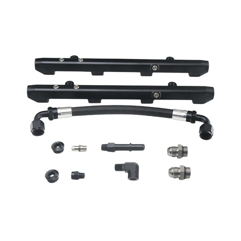 DeatschWerks fuel rails with crossover for 2020-23 Ford F-150 Coyote 5.0L engine, showing the polished metal design and fittings.