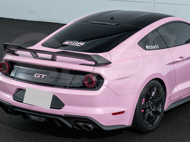 Dark Horse style carbon fiber rear wickerbill spoiler wing on a 2015-2023 Ford Mustang, designed for sporty aerodynamic enhancement.