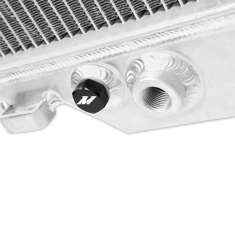 Mishimoto aluminum radiator for 2003-2007 Ford F250 with 6.0L Powerstroke engine, showing the sleek, lightweight design for cooling.