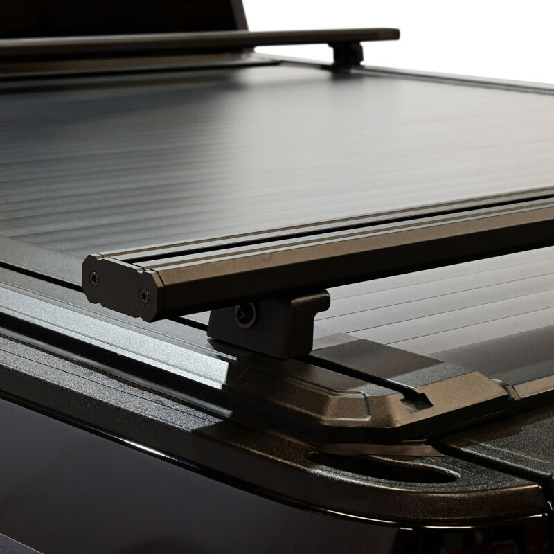 Westin retractable electric tonneau cover in black on Ford F-250/F-350 SD 6.8ft bed, showing sleek, durable design for truck bed protection.