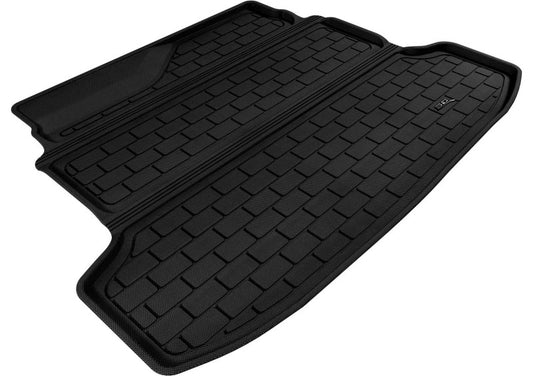 3D MAXpider black rubber cargo liner for Kia Forte Kagu (2010-2013) with textured surface and raised edges for protection.