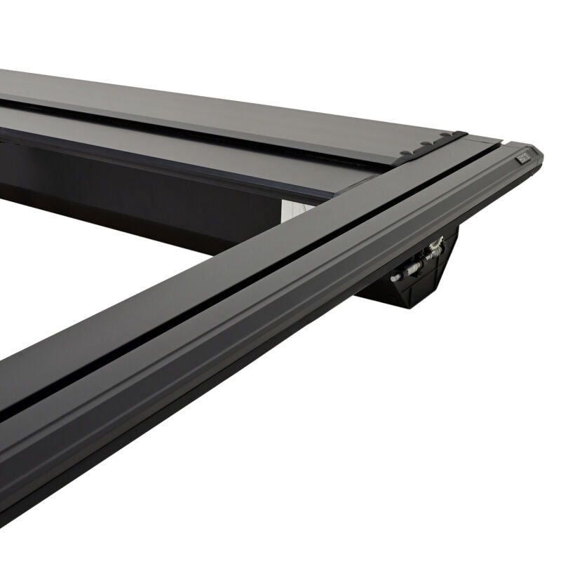 Westin roll-up tonneau cover in black on Silverado/Sierra 1500 bed, manual retractable design for 5ft 8in truck bed.
