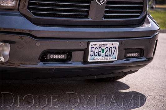 Diode Dynamics Ram 2013 Standard Stage Series 6-inch white LED light bar installed on vehicle, showcasing bright white illumination.