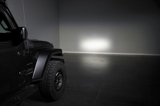 Diode Dynamics Jeep JL SS5 CrossLink bumper lightbar kit with sport driving light bars mounted on a Jeep JL's front bumper.