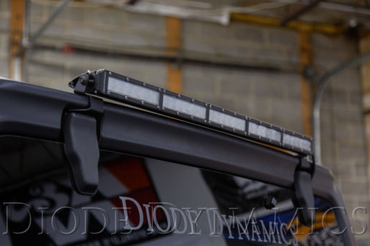 Diode Dynamics Jeep JL Wrangler SS30 rear hardtop bracket kit with white flood light mount installed on vehicle.
