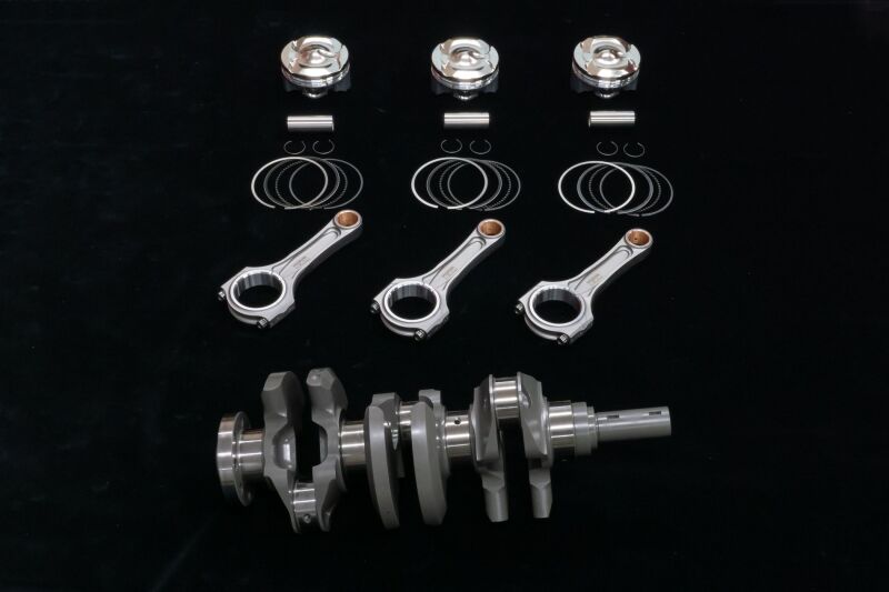 HKS G16E 1.75L Step 3 crankshaft showing precision-machined metal with brand markings and engine component details