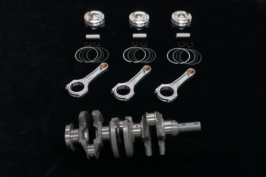 HKS G16E 1.75L Step 3 crankshaft showing precision-machined metal with brand markings and engine component details