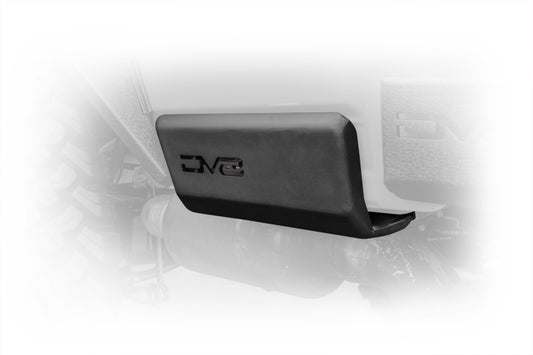 DV8 Offroad Jeep Gladiator 2019+ bedside sliders, exterior body armor and rock rails on a rugged vehicle side profile.