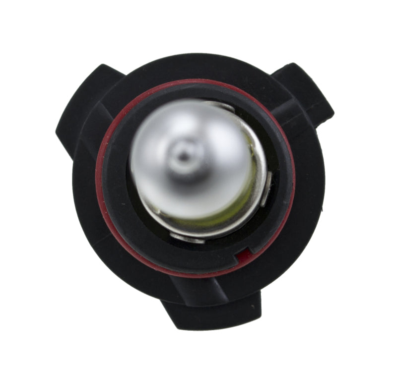 Hella 9006XS 12V 55W XenPure yellow bulbs for vehicle headlights, showing two Hella brand bulbs with yellow-tinted glass.