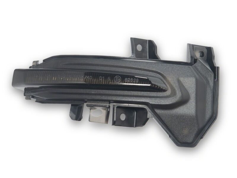 Raxiom smoked LED side mirror lights for Toyota Tundra 22-26 with sequential turn signal functionality.