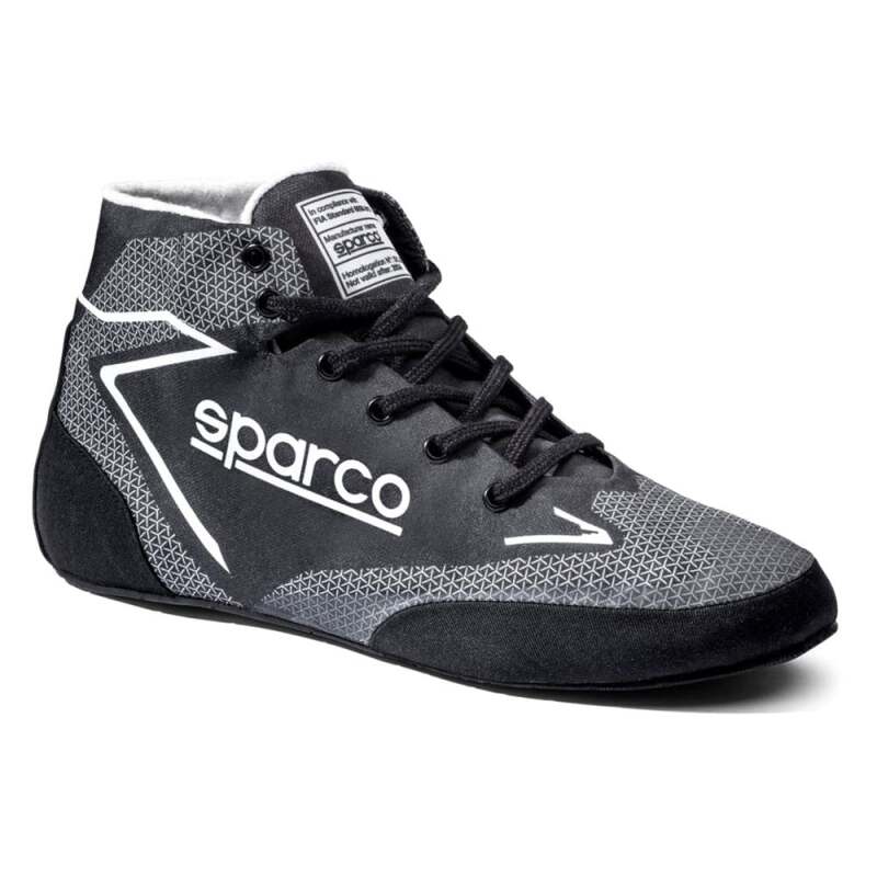 Black and white Sparco Prime Extreme racing shoes, size 42, featuring a sleek design and racing-specific construction.