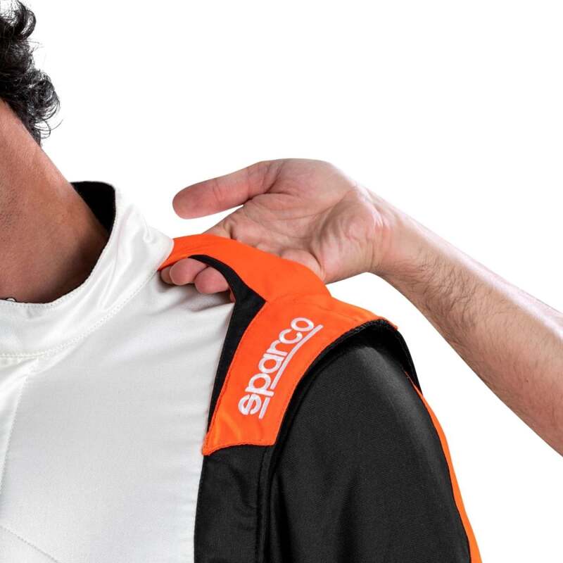 Sparco competition racing suit in white and orange, lightweight racing suit with safety features, designed for motorsport drivers.
