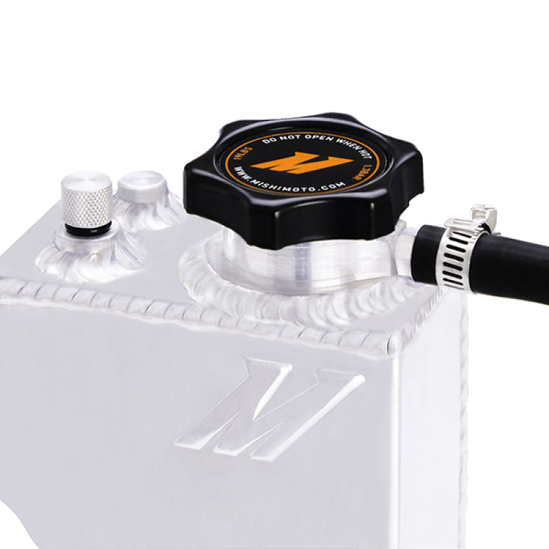 Mishimoto aluminum coolant expansion tank for BMW 3 Series (92-99), coolant reservoir with black cap and mounting bracket.