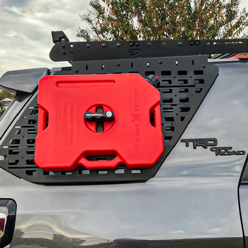 Cali Raised LED exterior window Molle panel on a 10-24 Toyota 4Runner T4R 5th Gen passenger side bed liner for off-road storage
