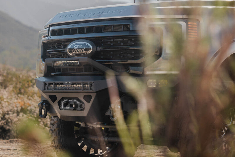 Steel front bumper for Ford Super Duty F-250/F-350 from DV8 Offroad Spec Series, rugged off-road bumper with sturdy design.