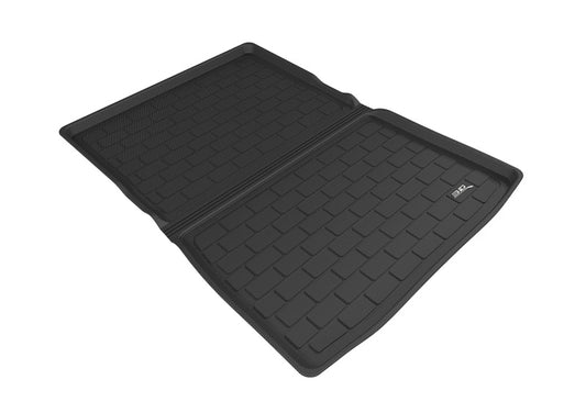 Black 3D MAXpider rubber cargo liner for BMW 7 Series (2016-2020), designed to protect the trunk floor with a textured surface.