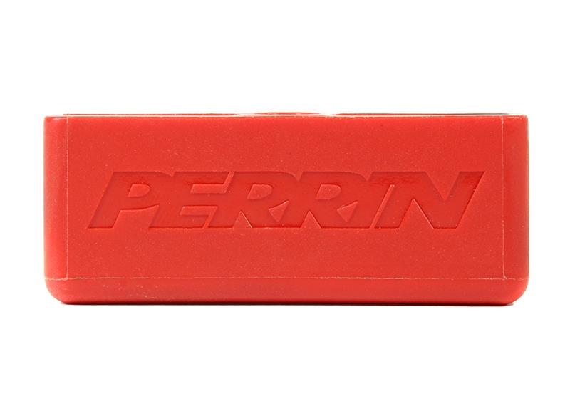 Red Perrin Performance trunk handle for Subaru BRZ and Toyota GR86/FR-S, mounted on the hatch of a car.