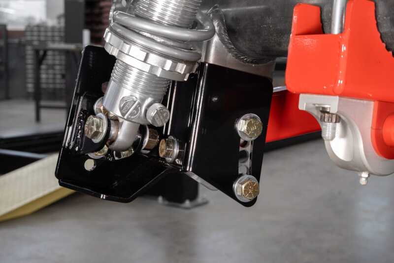 UMI Performance coilover conversion brackets kit for A-Body, includes brackets and 250lb spring, for -2 to -3 inch ride height.