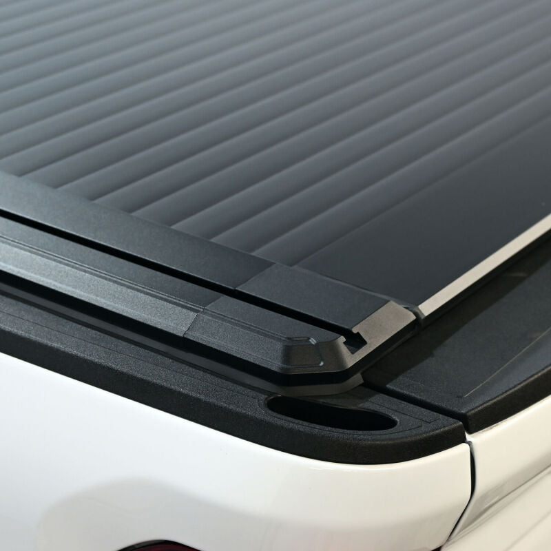 Westin black roll-up tonneau cover on Ford F-250/F-350/F-450/F-550 SD 6ft 10in bed, manual retractable for truck bed protection