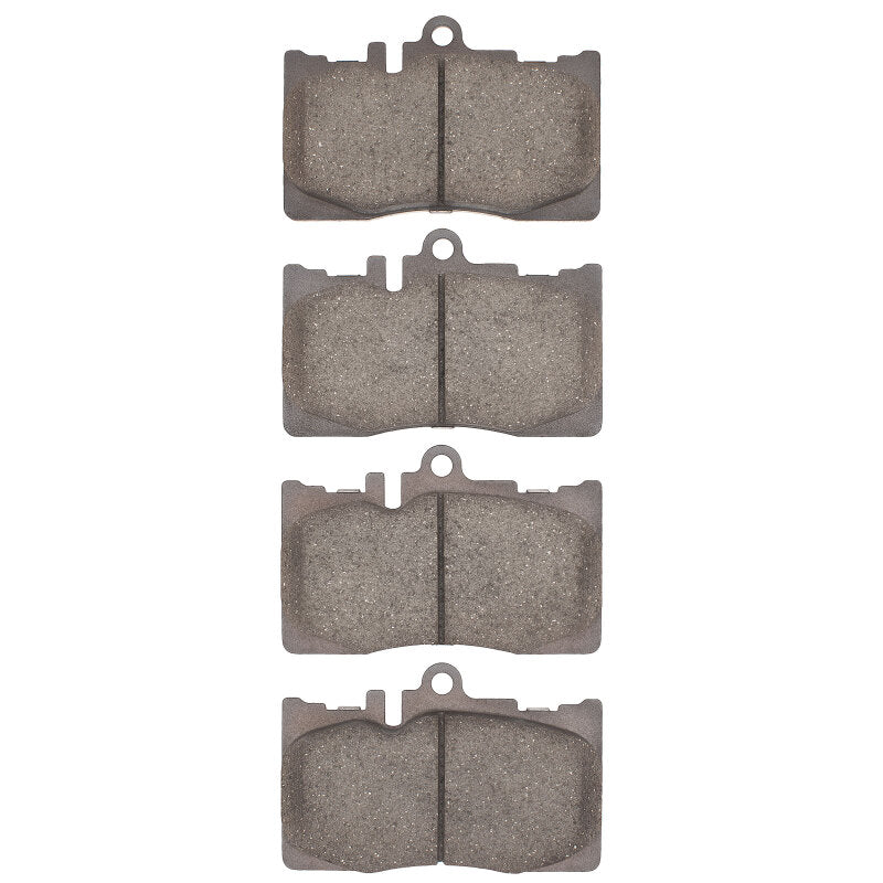 Lexus LS430 front brake pads by R1 Concepts, OE quality Optimum R1 01-06 model, showing new brake pad set with metal backing plates.