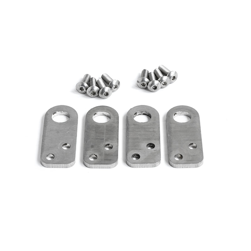 Set of four Snow Performance fuel rail brackets for 2021+ Ford F150 Coyote engine, designed for fuel rail installation.