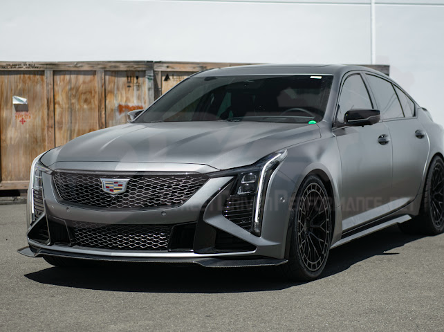 2025-present Cadillac CT5-V Blackwing factory OEM style carbon fiber front lip splitter and wheel arches, ground effects, sleek automotive design