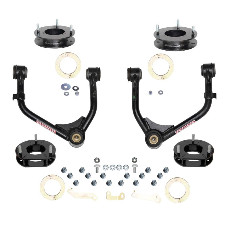 Skyjacker 3-inch suspension lift kit for Chevy Tahoe and GMC Suburban, showing assembled components and lifted vehicle suspension system.