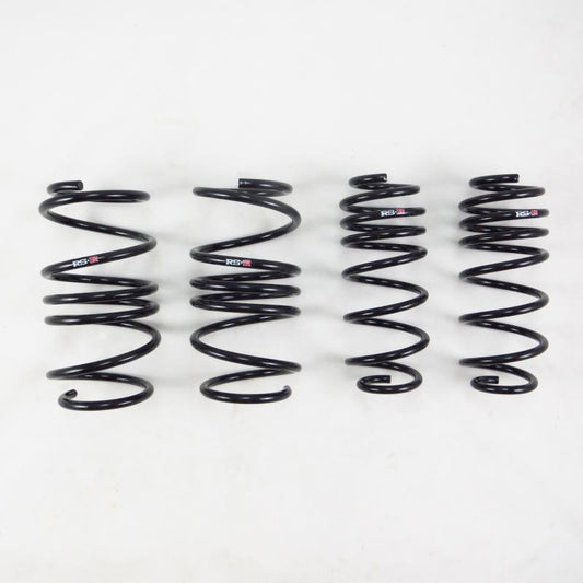 RS-R lowering springs for Toyota Corolla Axio NZE141L, JDM, displayed on a car suspension setup, designed for improved ride height.
