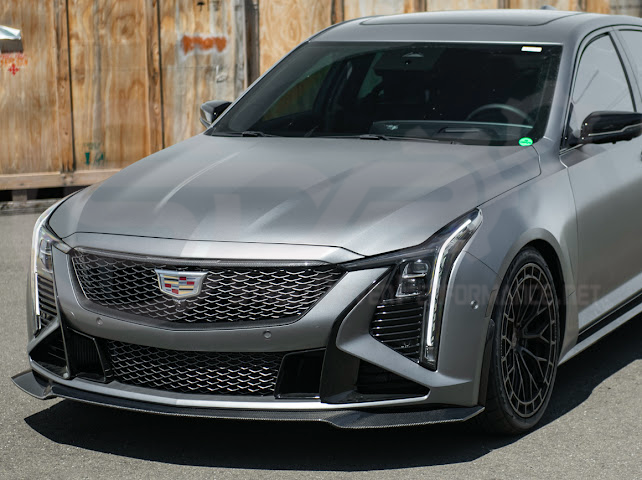 Cadillac CT5-V Blackwing factory OEM style carbon fiber front lip splitter and wheel arches, ground effects for sporty enhancement.