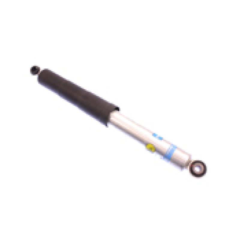 Bilstein 5100 Series rear 46mm monotube shock absorber for 2012 Suzuki Equator Sport, showing the shock's metal body and mounting details.