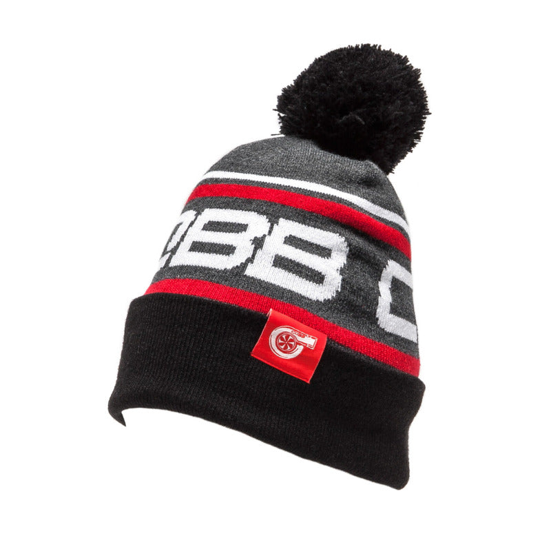 COBB Knit Beanie, cozy wool hat with ribbed texture, in neutral color, perfect for outdoor wear and cold weather.