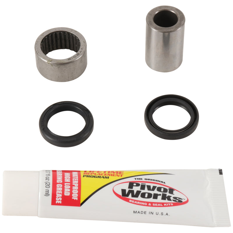 Pivot Works Yamaha YFZ450 rear shock bearing kit for control arms, showing assembled bearings and mounting components.
