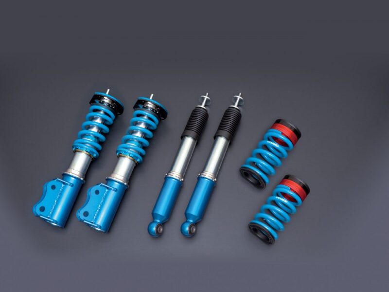 Cusco Sport R coilovers for 2003-2004 Subaru Impreza WRX STi, blue monotube coilover shocks with 24-way adjustable damping.
