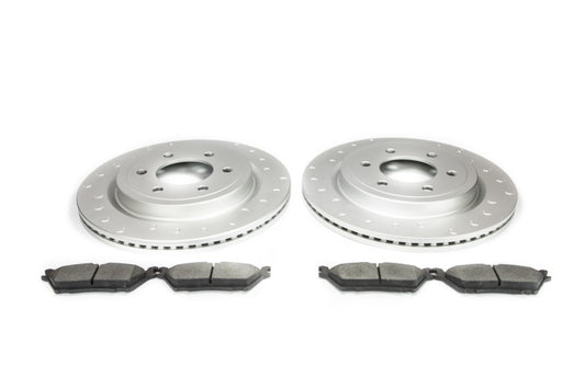 Alcon rear big brake kit with pads and rotors for Ford F-150 2018-2020, includes electronic parking brake components.