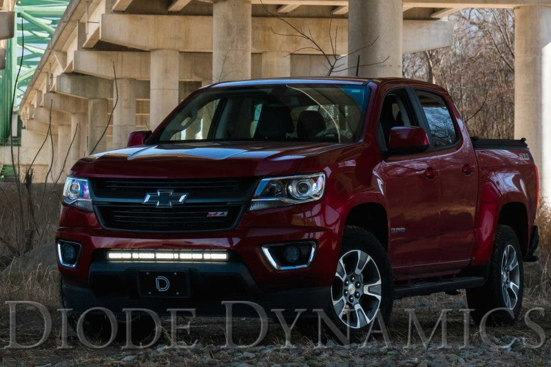 Diode Dynamics Colorado/Canyon SS30 Stealth Lightbar Kit with amber and clear lights mounted on a vehicle for off-road illumination.