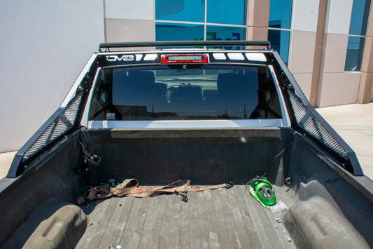 DV8 Offroad chase rack installed on 2010-2018 Ram 2500/3500 pickup truck, bolt-on design with rugged off-road style