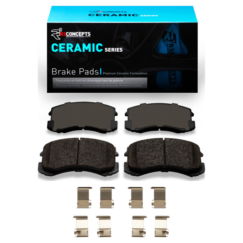 R1 Concepts Mitsubishi Lancer front ceramic brake pads and hardware kit, OE style, installed on vehicle.