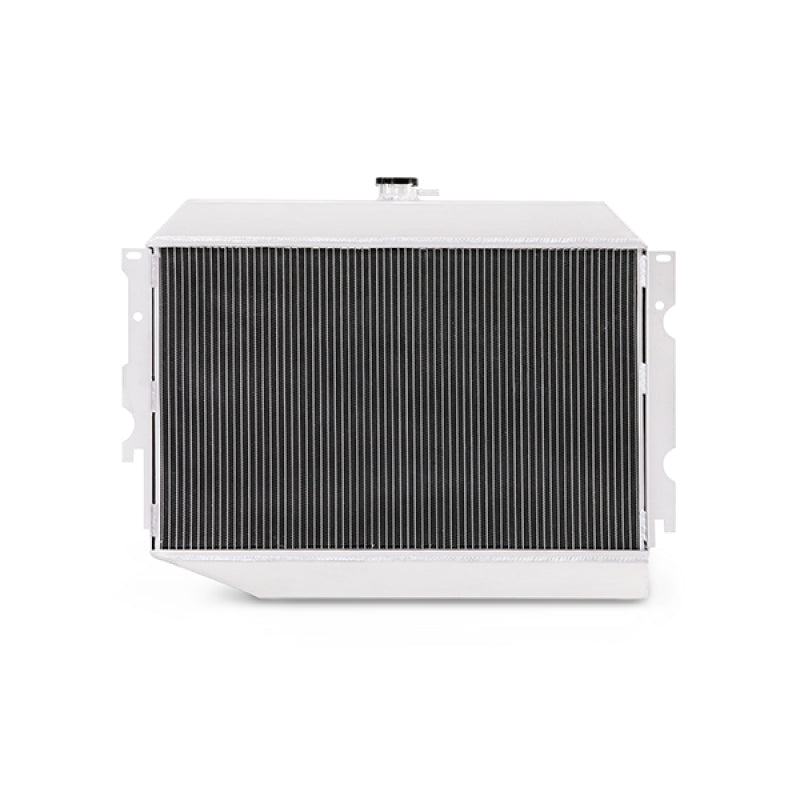 Mishimoto small block X-Line aluminum radiator for 1970-1973 Plymouth Barracuda, with core and end tanks visible in the image.