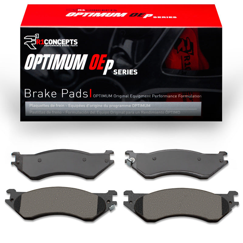 R1 Concepts OE front brake pads for Dodge Ram 1500 1997-2004 pickup truck, showing the brake pad set with brake surface details.