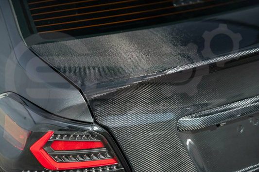 Carbon fiber rear trunk lid with integrated spoiler wing for 2015-2021 Subaru WRX STI, featuring a blemished, discounted SDOpenBox trunk.