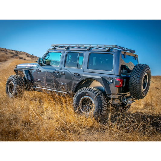 DV8 Offroad 18-21 Jeep Wrangler JL 4-door roof rack mounted on vehicle for cargo carrying and outdoor adventures.