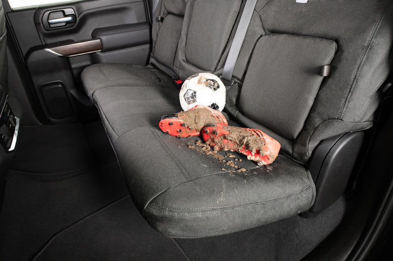 Covercraft Carhartt Super Dux PrecisionFit seat covers for Ford E-Series Custom, charcoal fabric, installed on vehicle seats.