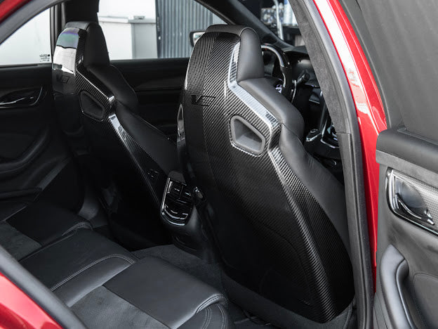 Cadillac ATS-V sedan Recaro carbon fiber seat rear panel cover replacement for driver and passenger seats, by Street Driven Performance.