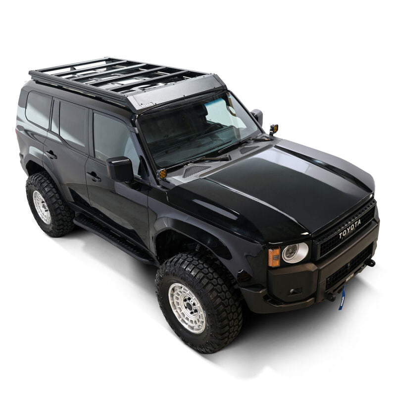 Westin 2026 Toyota Land Cruiser Mesa roof rack mounted on vehicle for added cargo space and durability.