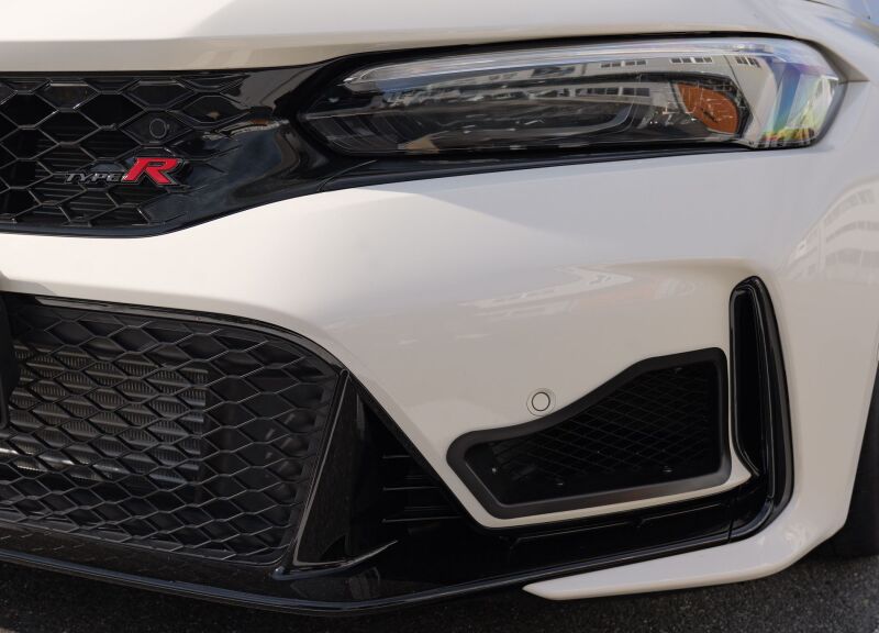 HKS 2023+ Honda Civic Type R FL5 S Type black oil cooler kit installed on engine, showcasing the compact cooling system.