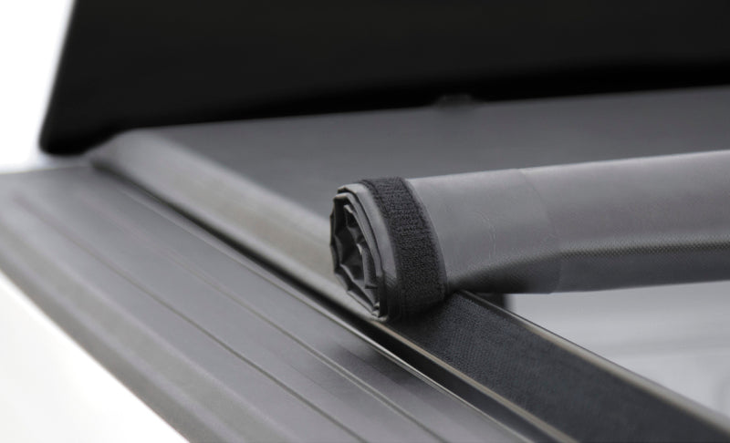 Access Literider roll-up truck bed cover on a Ford Explorer Sport Trac with 4ft 2in bed, exterior truck bed accessory, bolt-on installation