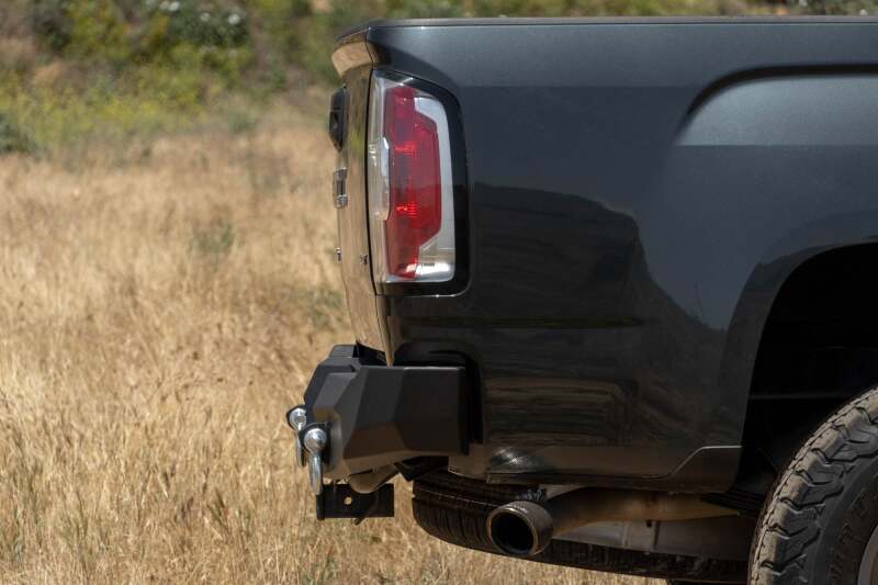 Steel rear bumper for Chevy Colorado and GMC Canyon by DV8 Offroad, part of the MTO Series, designed for offroad durability.